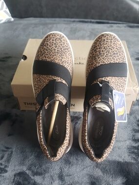 Clarks Women’s Leopard Print Slip-On Sneakers